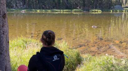 Courtney taking some time to enjoy the view during a long hike