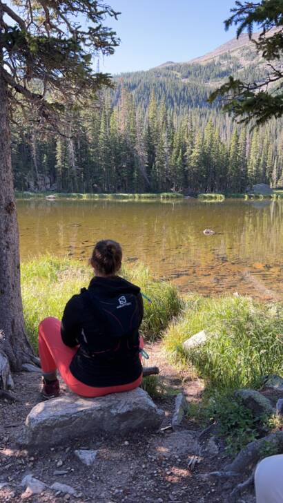 Courtney taking some time to enjoy the view during a long hike