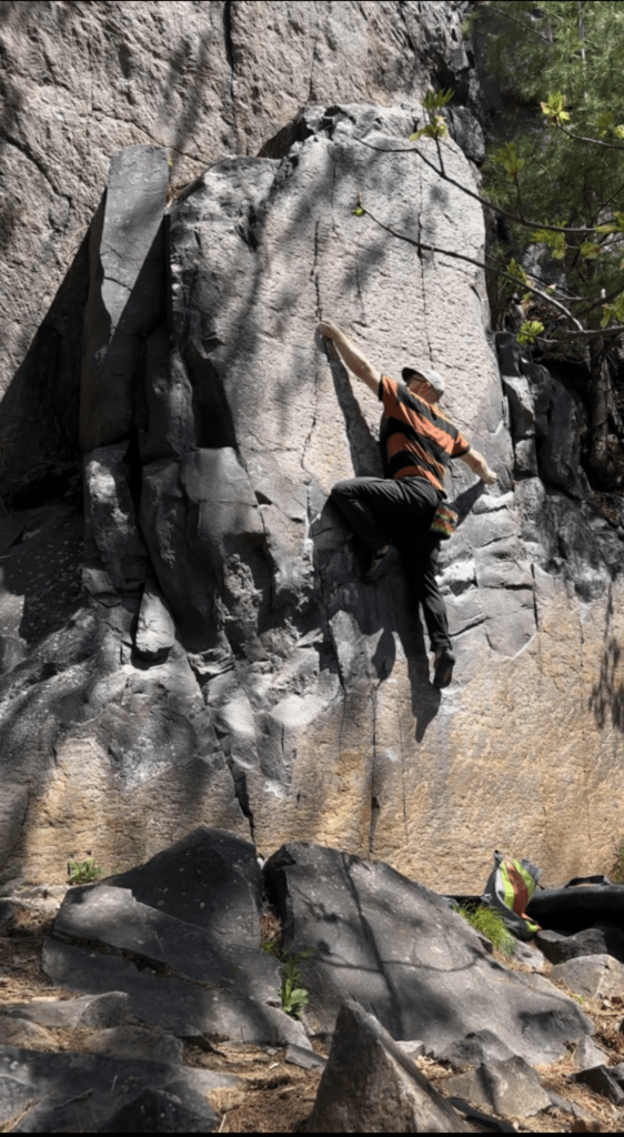 Eamon Bouldering outside at devils lake state park in wisconsin