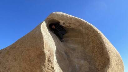 Eamon on a boulder in Joshua Tree National Park