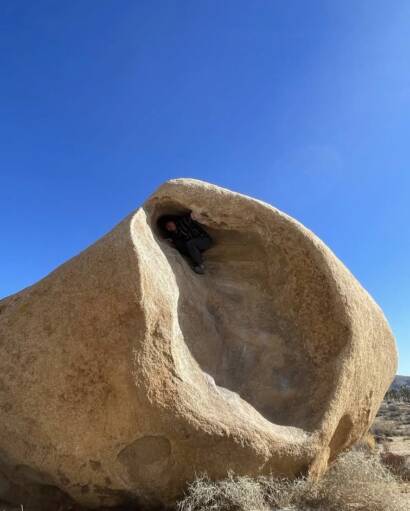 Eamon on a boulder in Joshua Tree National Park