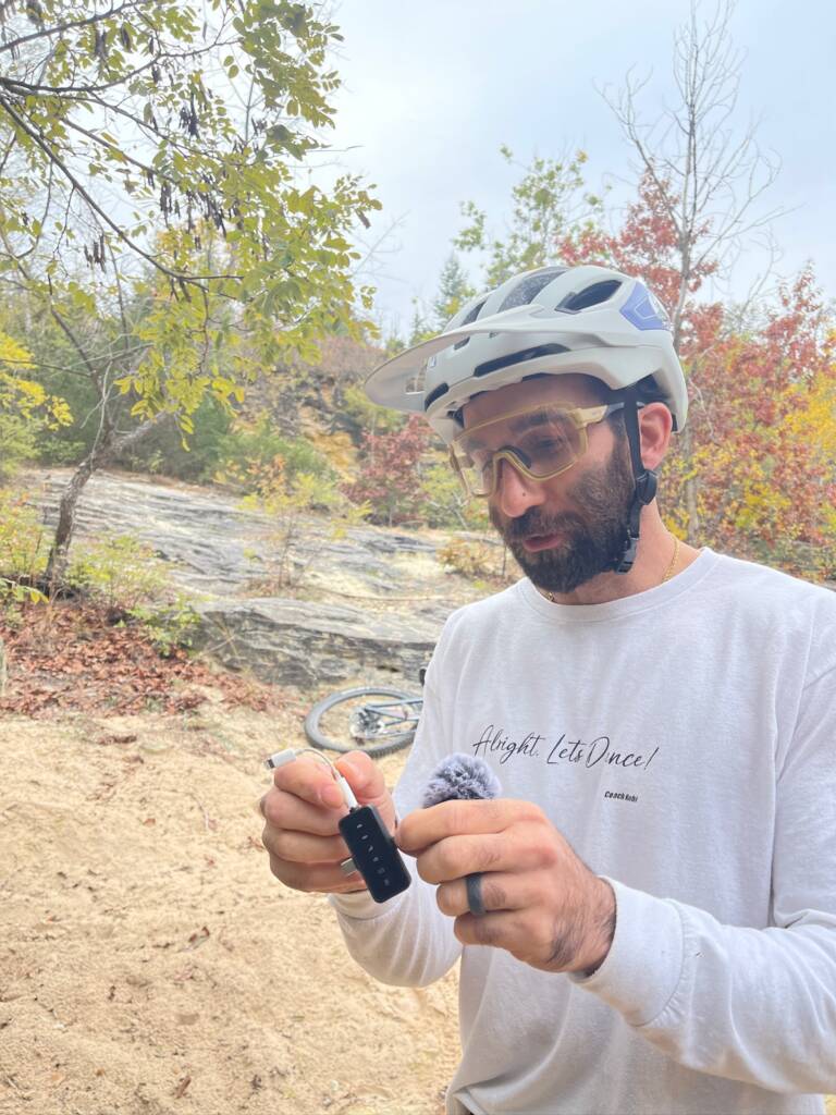 coach kubi is taking a break on the mountain bike trails