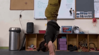 Shelby doing a handstand.