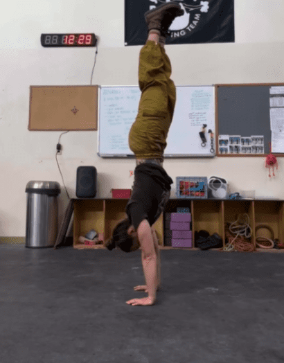 Shelby doing a handstand.