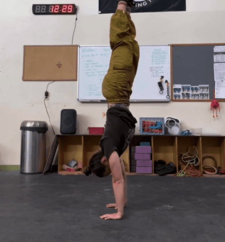 Shelby doing a handstand.