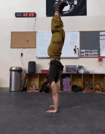 Shelby doing a handstand.