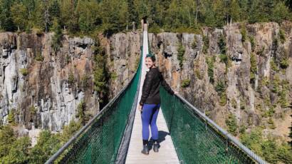 Courtney celebrating earth day on a suspense bridge in Canada