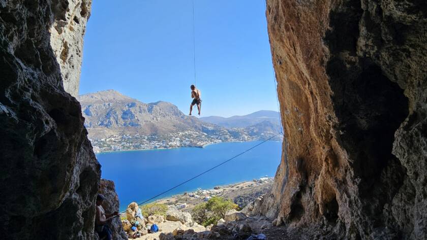 embracing the feeling of fear by rock climbing by the lake