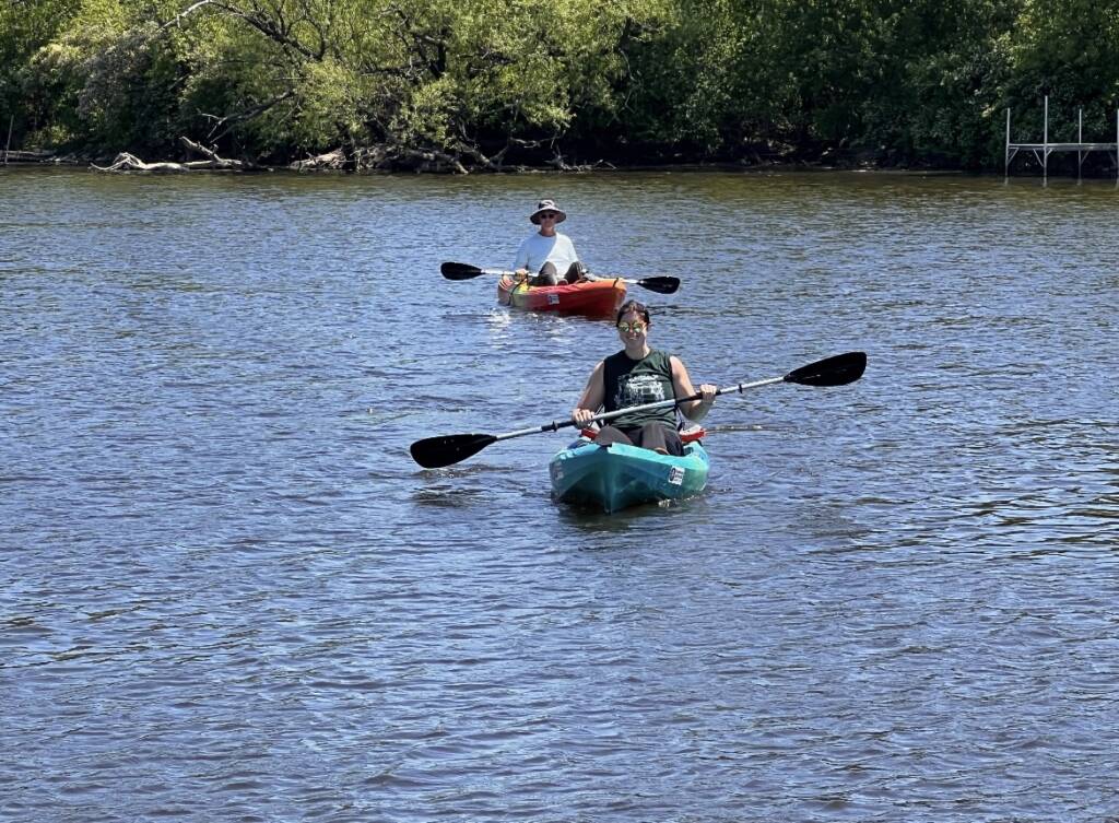 Courtney utilizing outdoor experiences kayaking on milwaukee river with Forward Outdoor. enjoying other activities like kayaking while training with the seasons