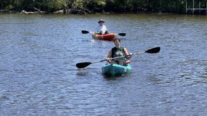 Courtney utilizing outdoor experiences kayaking on milwaukee river with Forward Outdoor