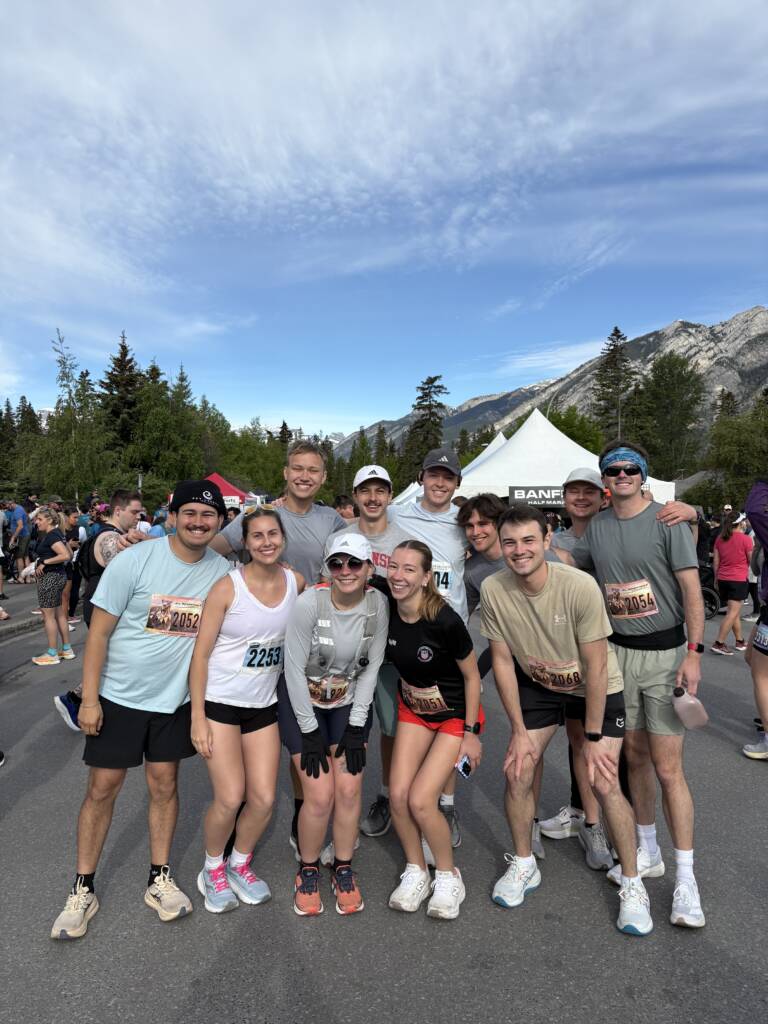 Group photo taken before the Banff National Park Half Marathon 2026.