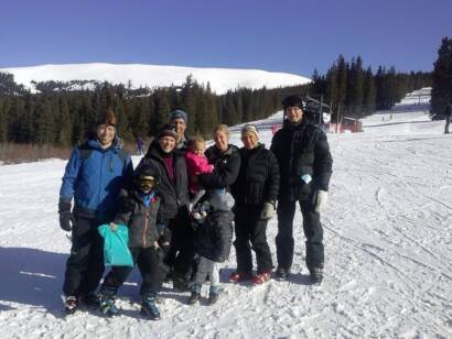 Family Skiing on a mountain after training for a lifetime of movement